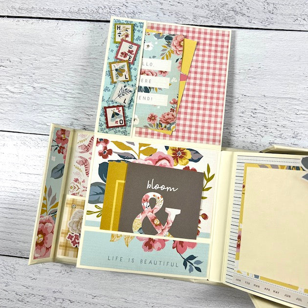 Hi Friend Scrapbook Album Page with a flip-up element, pocket, and pretty papers with flowers