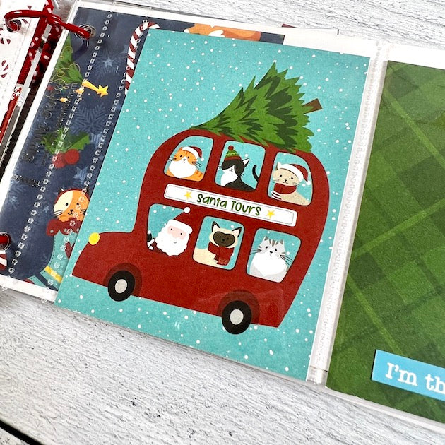 Cat Christmas Scrapbook Album Page with Santa, red bus and Christmas Tree