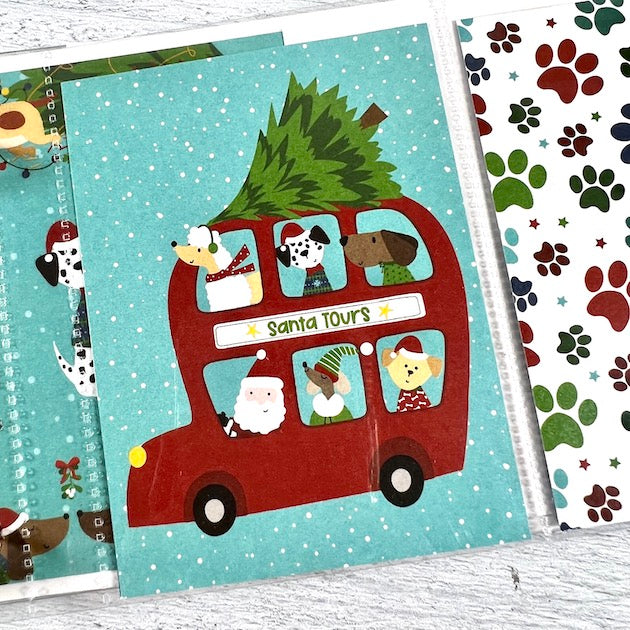 Dog Christmas Scrapbook Album Page with Santa, red bus and Christmas Tree