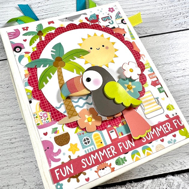 Summer Fun scrapbook mini album with toucan, flowers and sunshine
