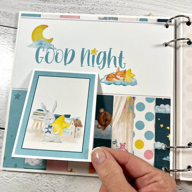 Sweet Baby Scrapbook Album Page with sleeping animals, a moon, and stars
