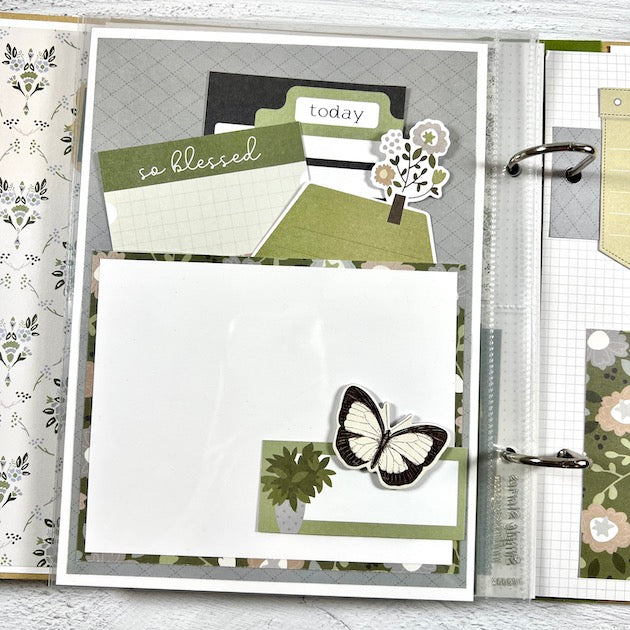 Together Family & Home Scrapbook Album page with a butterfly, flowers, a pocket, and journaling cards