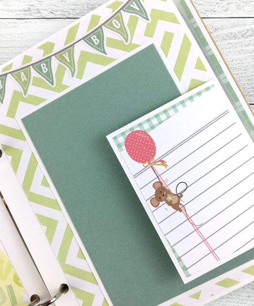 Baby Boy Scrapbook Album Page with a folding cards, a banner, and a cute mouse holding a balloon