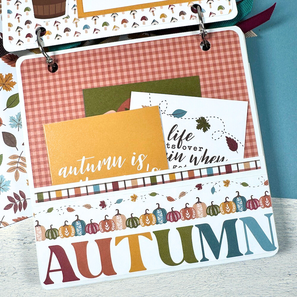 Sweater Weather Fall Scrapbook Album page with a pocket, journaling cards, pumpkins, and a cute gingham print