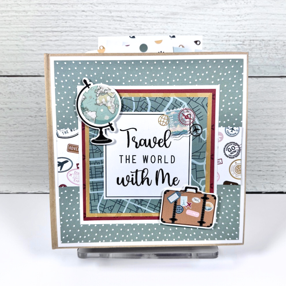 Travel The World With Me Scrapbook Album with map, globe, suitcase, and travel stamps