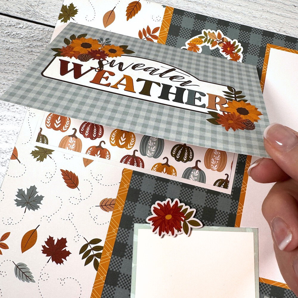 12x12  Sweater Weather Fall Scrapbook Page Layout with leaves, flowers, pumpkins, and a folding card