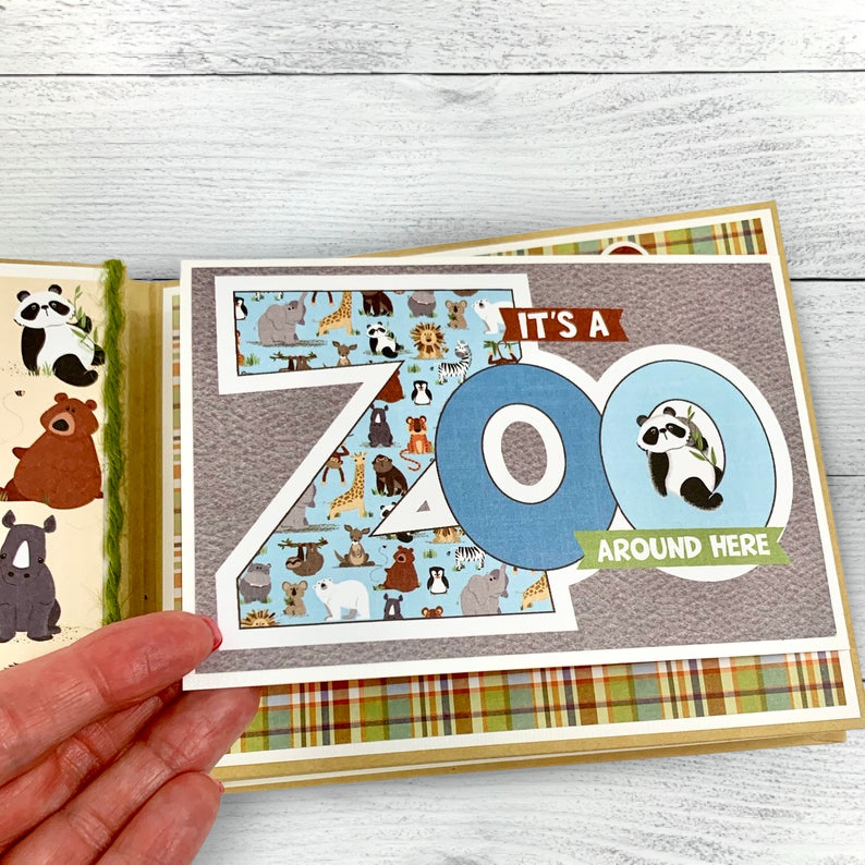 Fun Day at the Zoo Scrapbook Album Page with a folding card, lots of zoo animals, and a colorful plaid paper
