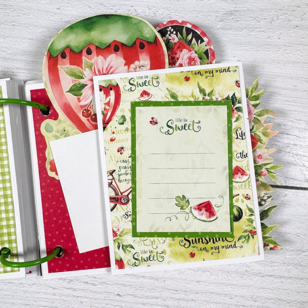Summer Scrapbook Album page with watermelon, a hot air balloon, flowers, and a folding element