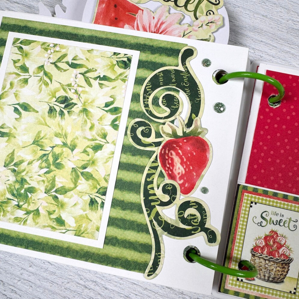 Summer Scrapbook Album Page with a strawberry, watermelon stripes, glitter dots, and leaves