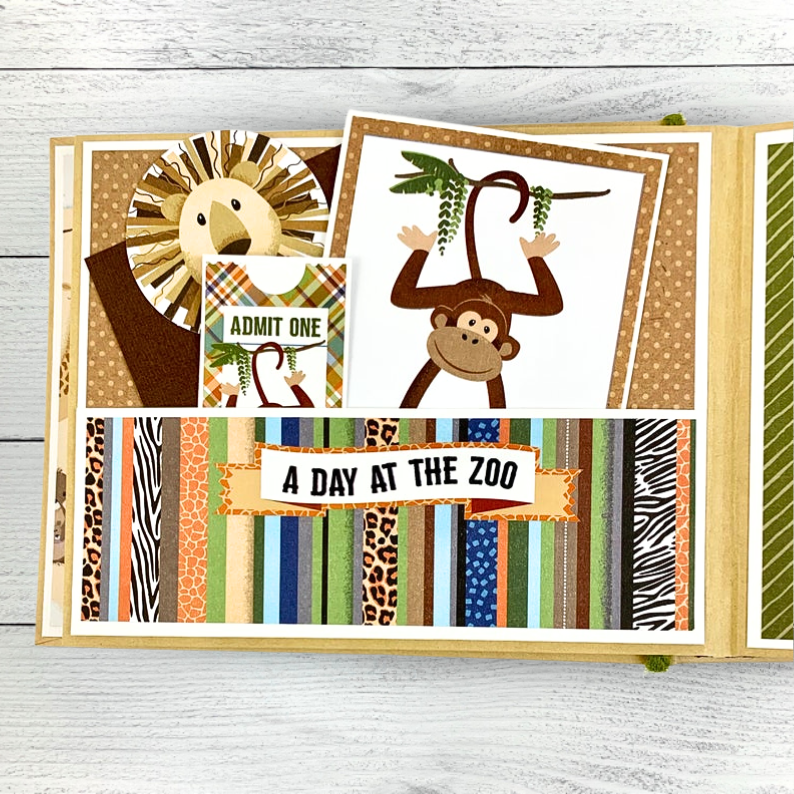 Fun Day at the Zoo Scrapbook Album Page with a pocket, journaling cards, a lion, and a monkey
