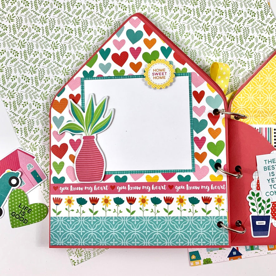 House shaped scrapbook envelope album with hearts and flowers