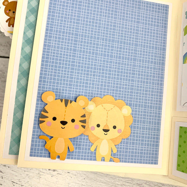 baby boy scrapbook mini album page with tiger and lion