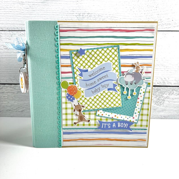 Baby Boy Scrapbook Album with a cute giraffe, balloons, a hippo, and colorful stripes