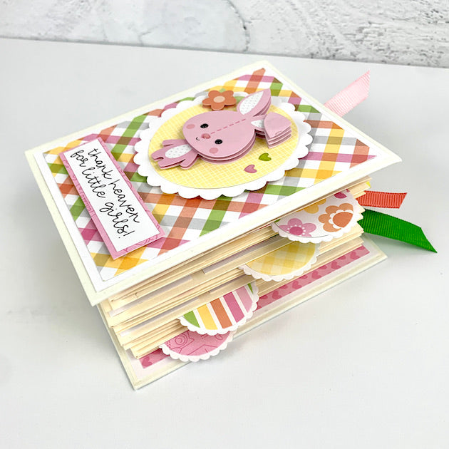 baby girl scrapbook mini album side view with scalloped circle tabs