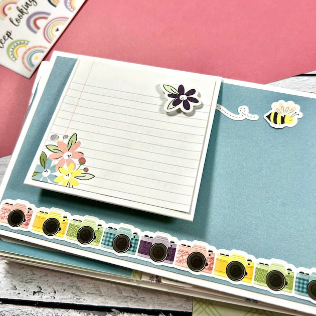 Hello Beautiful Friend Scrapbook Album Page with flowers, a bee, cameras, & a lined journaling card