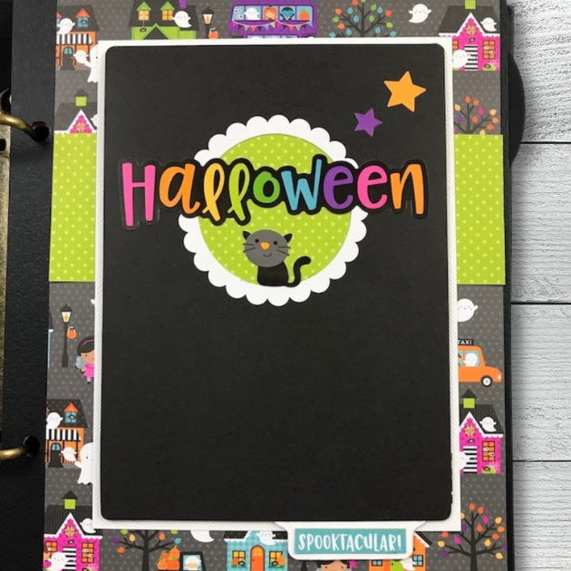 Halloween Booville Scrapbook page with folding card, rainbow halloween, and black cat