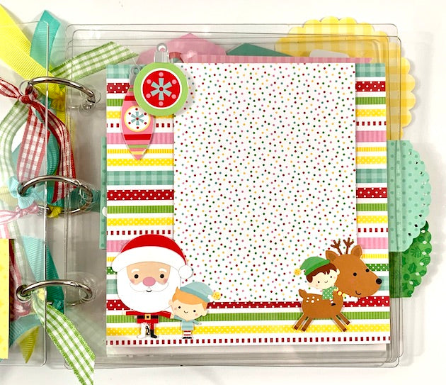 Clearly Christmas Scrapbook Mini Album page with Santa Claus, elves, a reindeer, and ornaments 