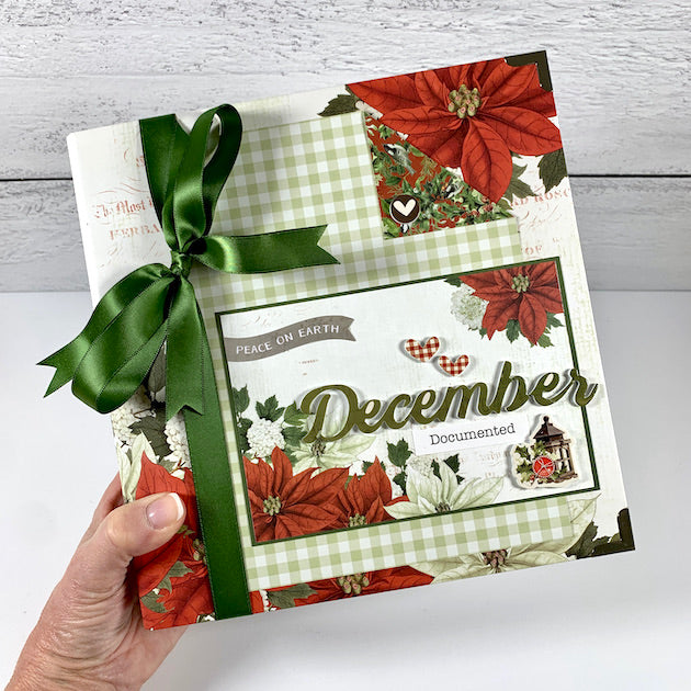 december documented christmas scrapbook album with green ribbon