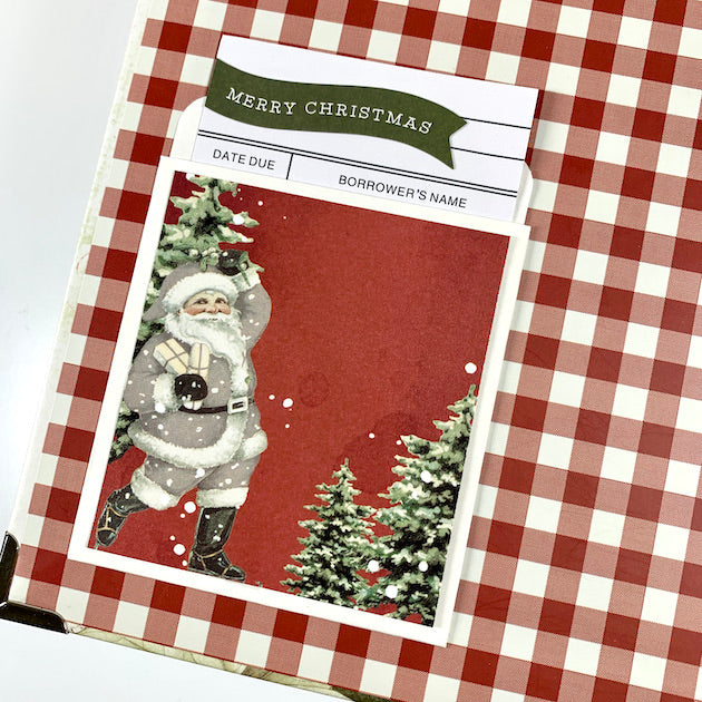 december documented christmas scrapbook album page with santa and pocket
