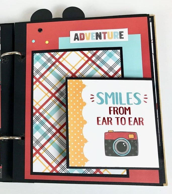 Disney Themed Scrapbook Album Page with a camera, a colorful plaid, an enamel dots
