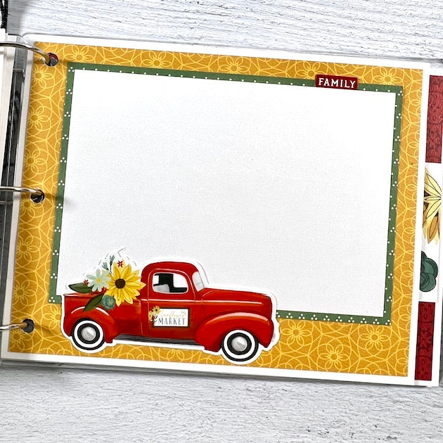 We Are Family Scrapbook Album page with red truck and flowers