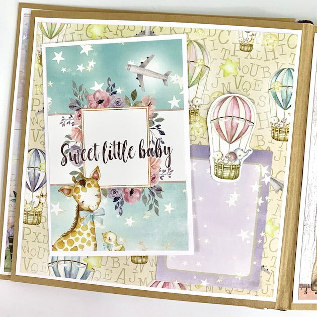 Hello Baby Scrapbook Album with hot air balloons, stars, and baby animals