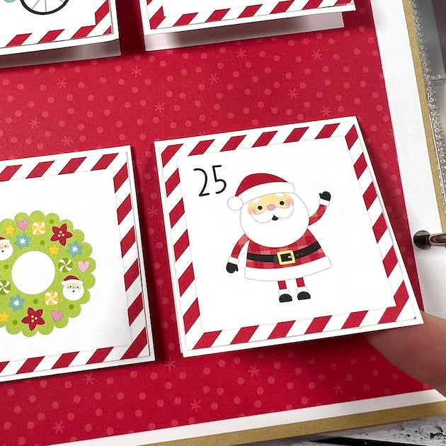 Christmas Scrapbook Page with folding cards, Santa, and wreath