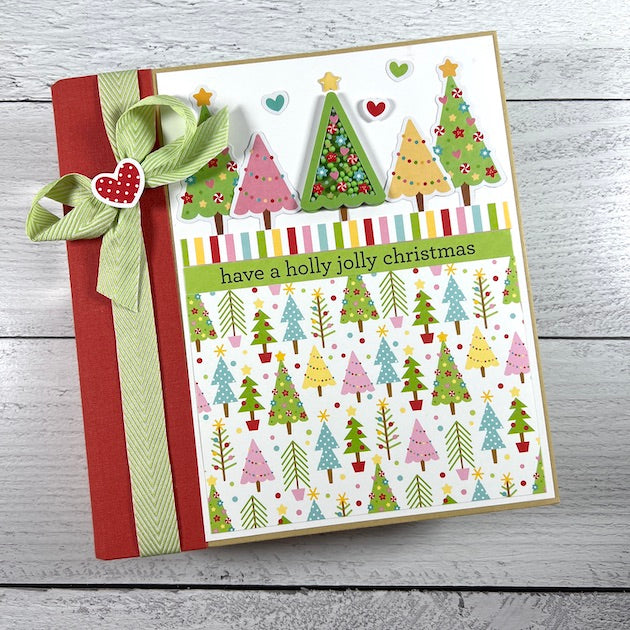 Christmas Scrapbook Album with colorful trees and a shaker