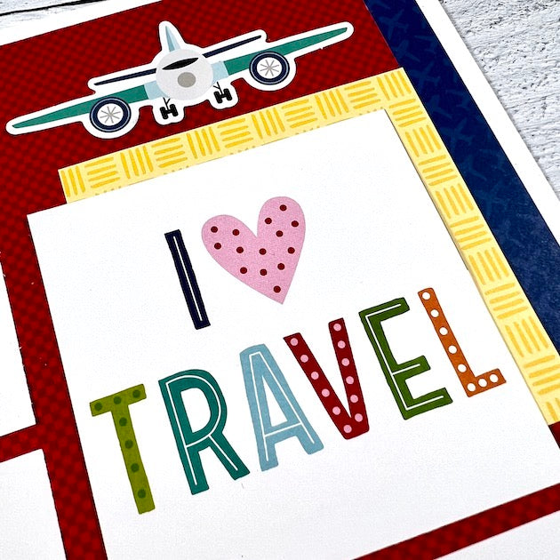 12x12 travel scrapbook page layout with airplane