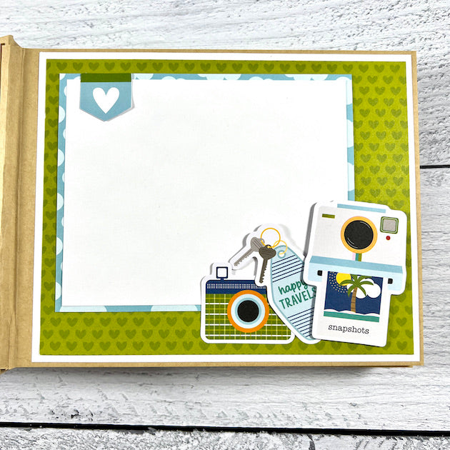 Time To Travel Scrapbook Album Page with hearts, camera & keys stickers