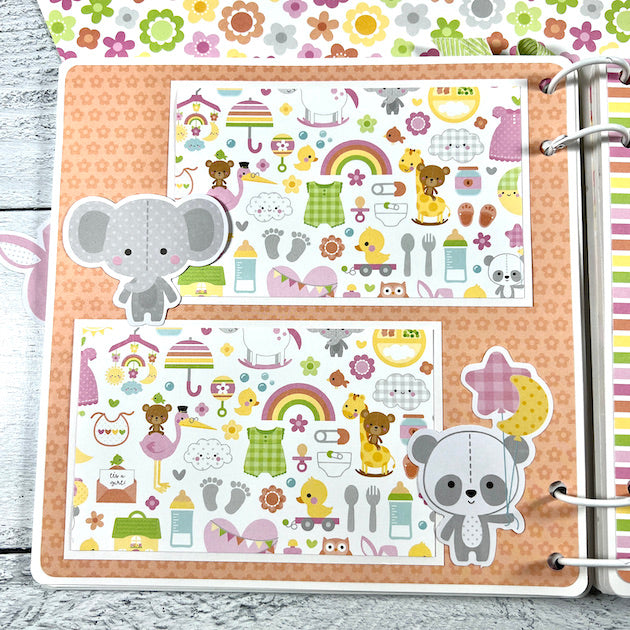 Baby girl scrapbook album page with elephant and panda