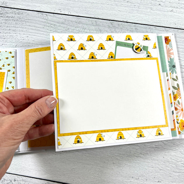 Spring Scrapbook album with folding page, bees, and beehives