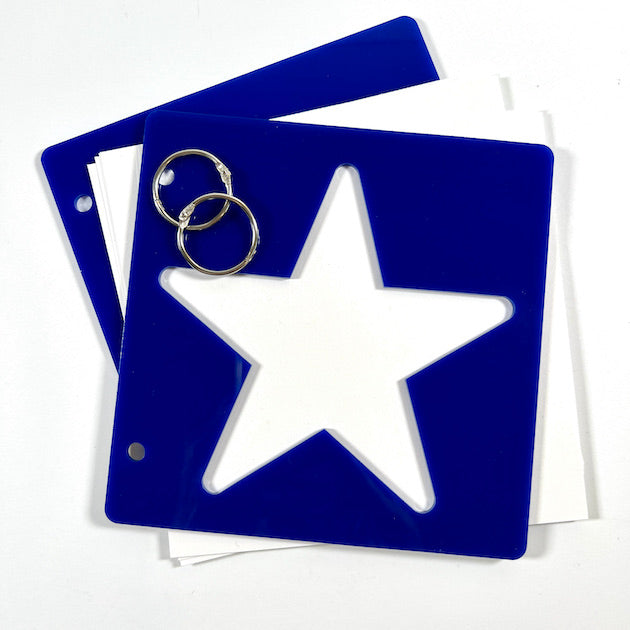 Blue acrylic scrapbook album with star cut-out & white pages
