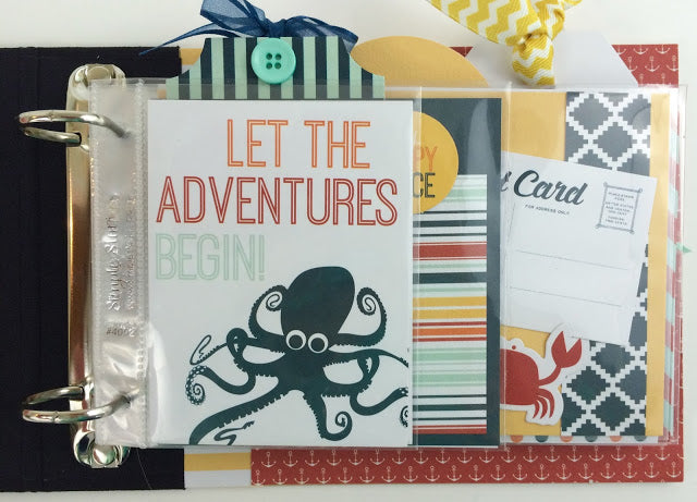Under The Sun Scrapbook Album page with an octopus, crab, a button, tags, ribbon, and colorful stripes