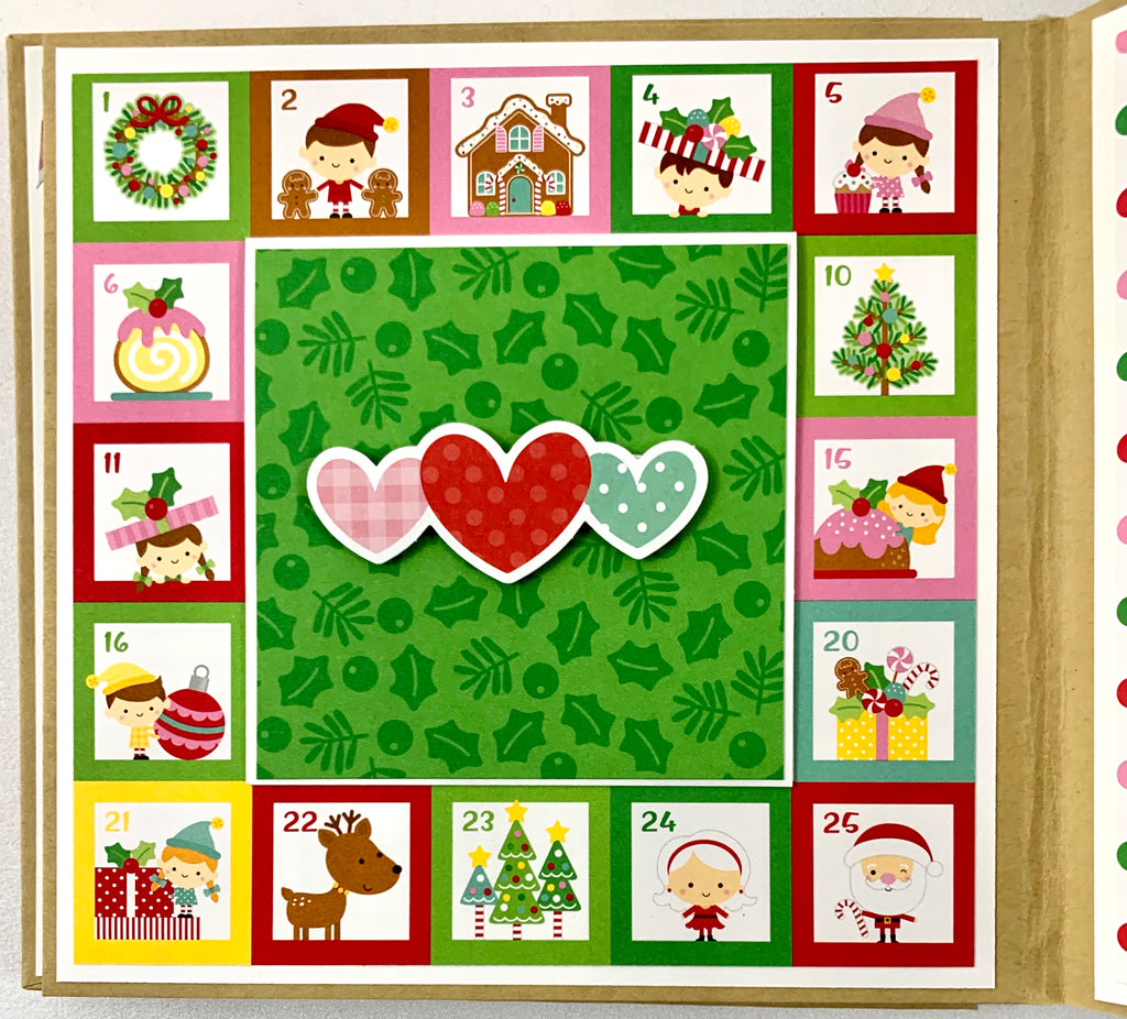 Merry Christmas Scrapbook Album page with eleves, reindeer, hearts, presents, and a tree