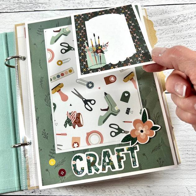 Crafting Scrapbook Album with pictures of art supplies
