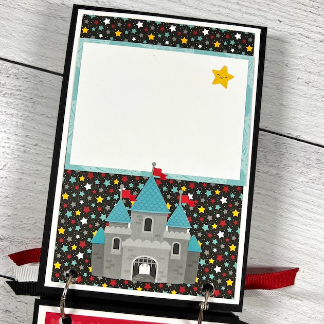 Disney themed scrapbook album page with the castle & stars