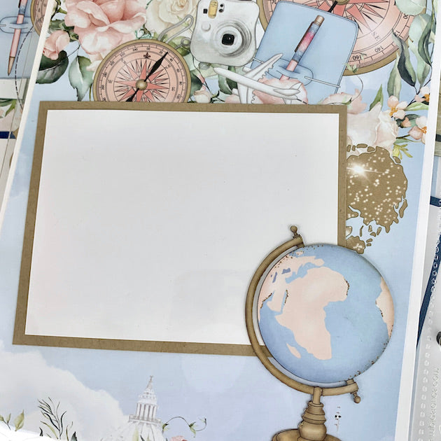 Let's Travel Scrapbook Page with globe, compass, airplane and flowers