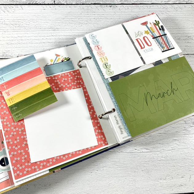 Monthly Scrapbook Page for March with photo mats