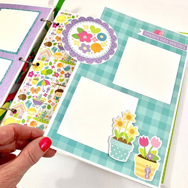Simply Spring Time Scrapbook Album Page with flowers and a folding elements for more photos
