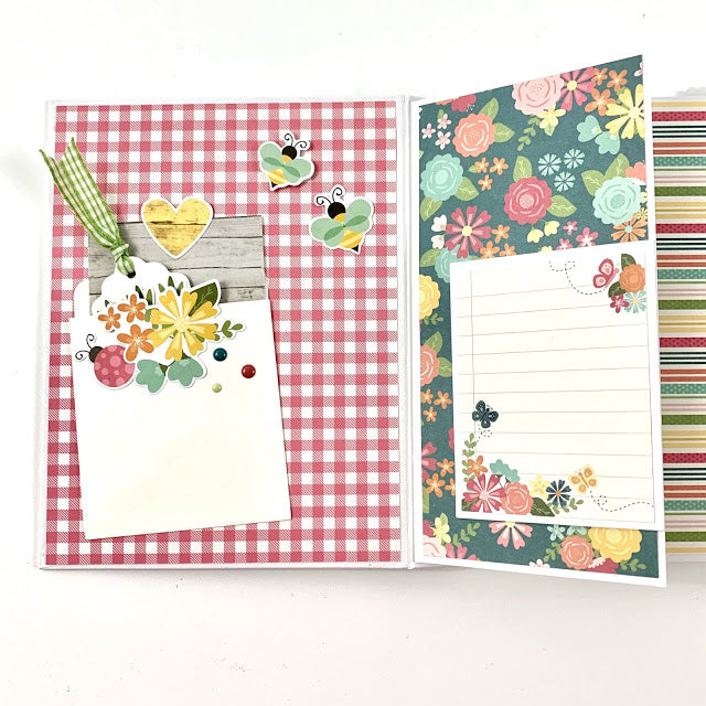 Hello Spring Easter scrapbook album page with a fold-out, pretty flowers, an envelope pocket, bees, and a journaling spot