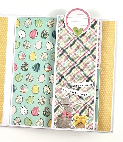 Hello Spring Easter scrapbook album page with lots of colorful eggs, a bunny rabbit, basket, and a journaling spot