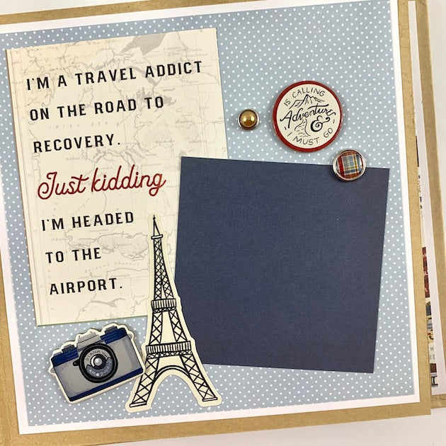 Our Greatest Adventure Travel Scrapbook Album Page with the Eiffel Tower, enamel brads, a camera, and cute little polka dots