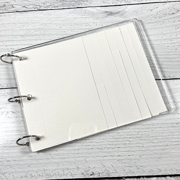 Clear acrylic scrapbook album with waterfall pages