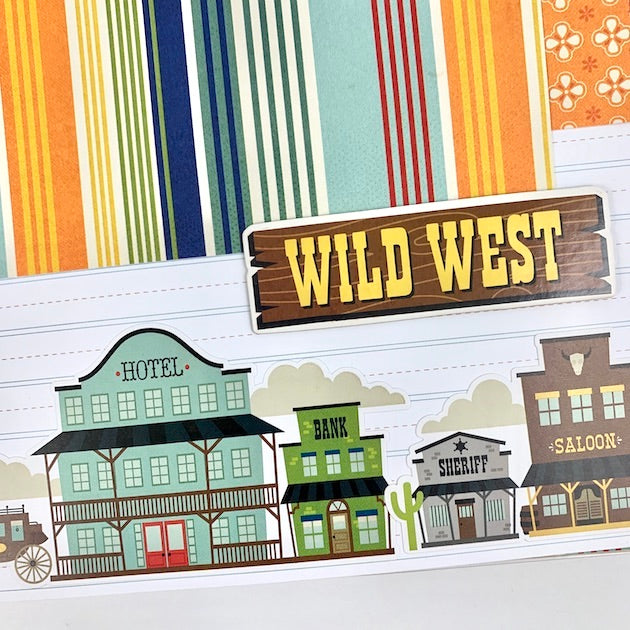 Howdy Western Themed Scrapbook Album page with western town buildings