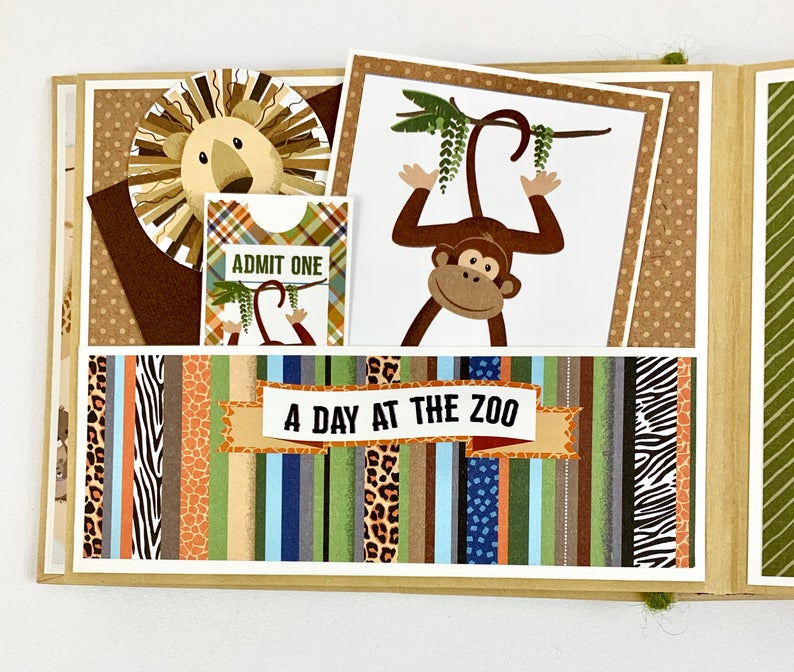 Fun Day at the Zoo Scrapbook Album page with a lion, monkey, and a pocket with journaling cards