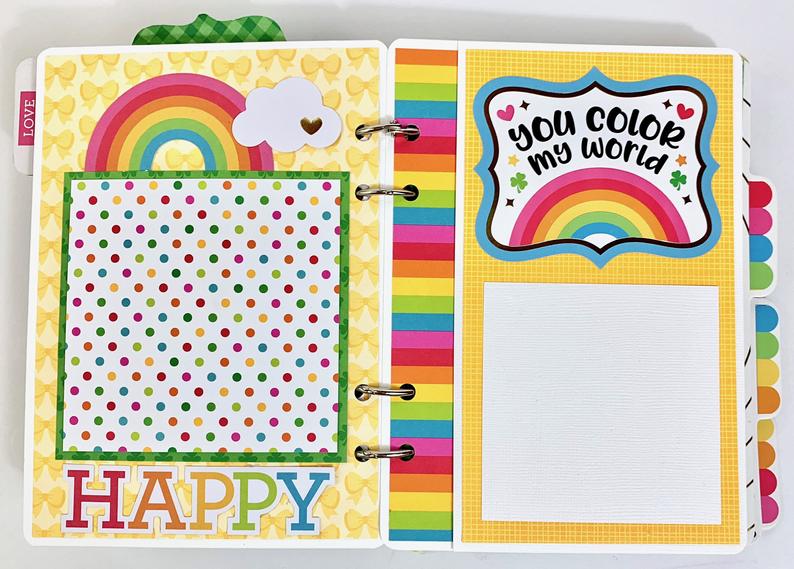 Lucky Charm Scrapbook Album Pages with rainbows, polka dots, and bows